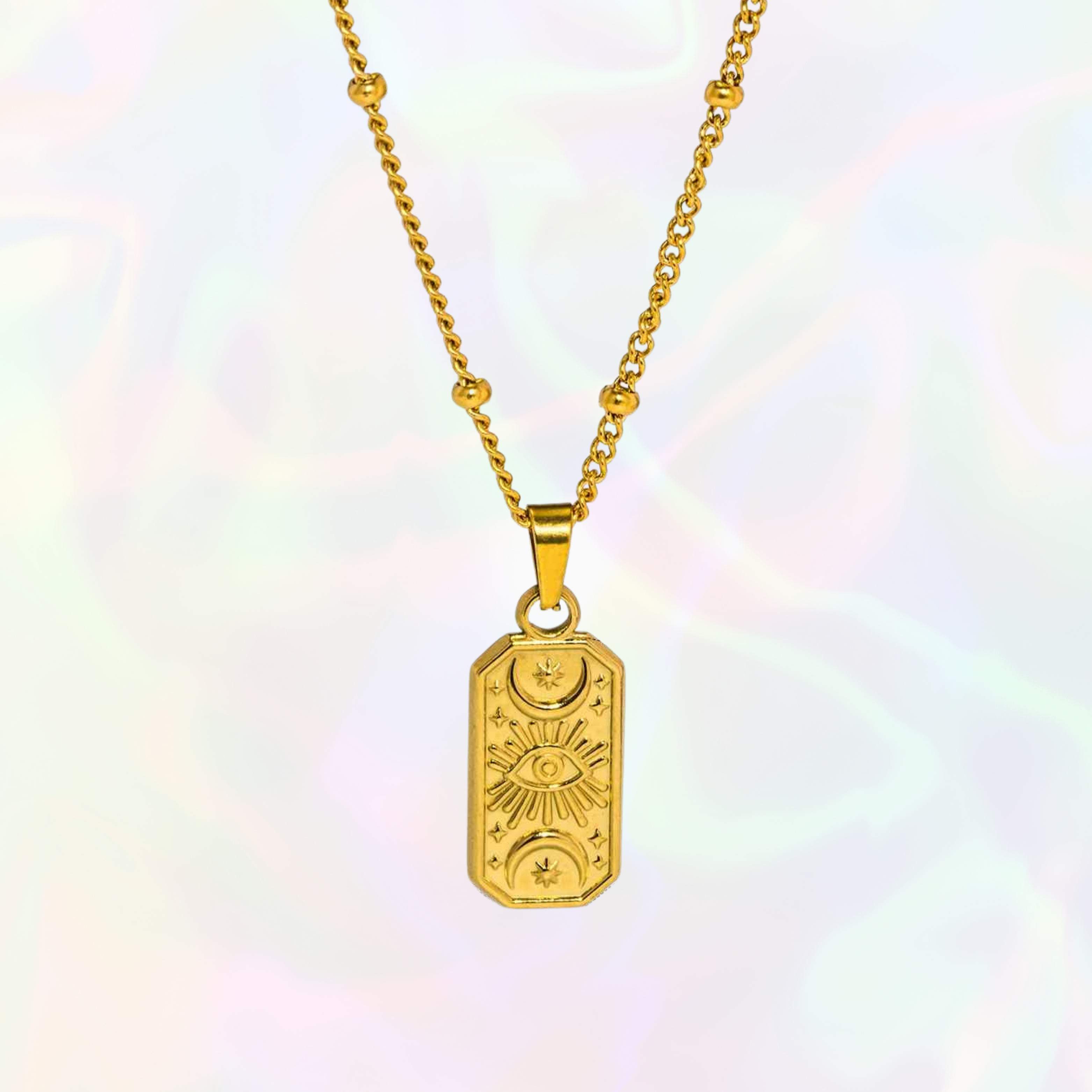 Gold evil eye necklace with a pendant on a colorful gradient background. Stainlesss steel