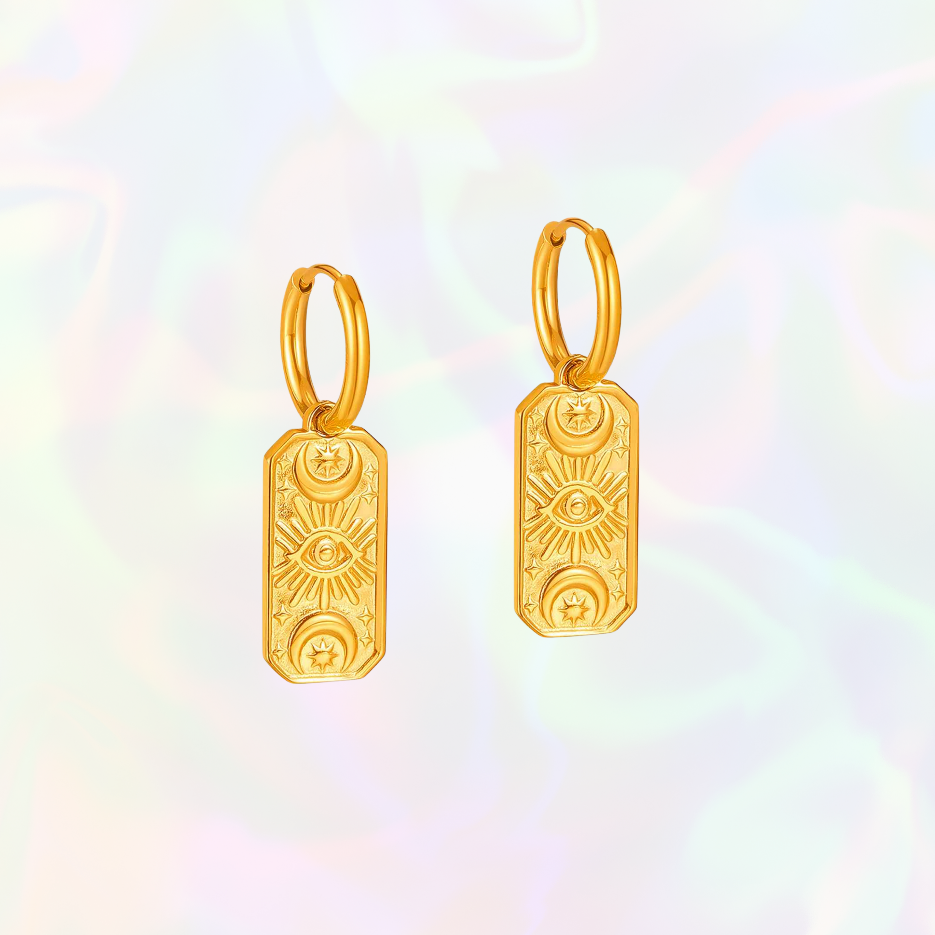 Gold evil eye earrings with symbolic designs on a colorful gradient background