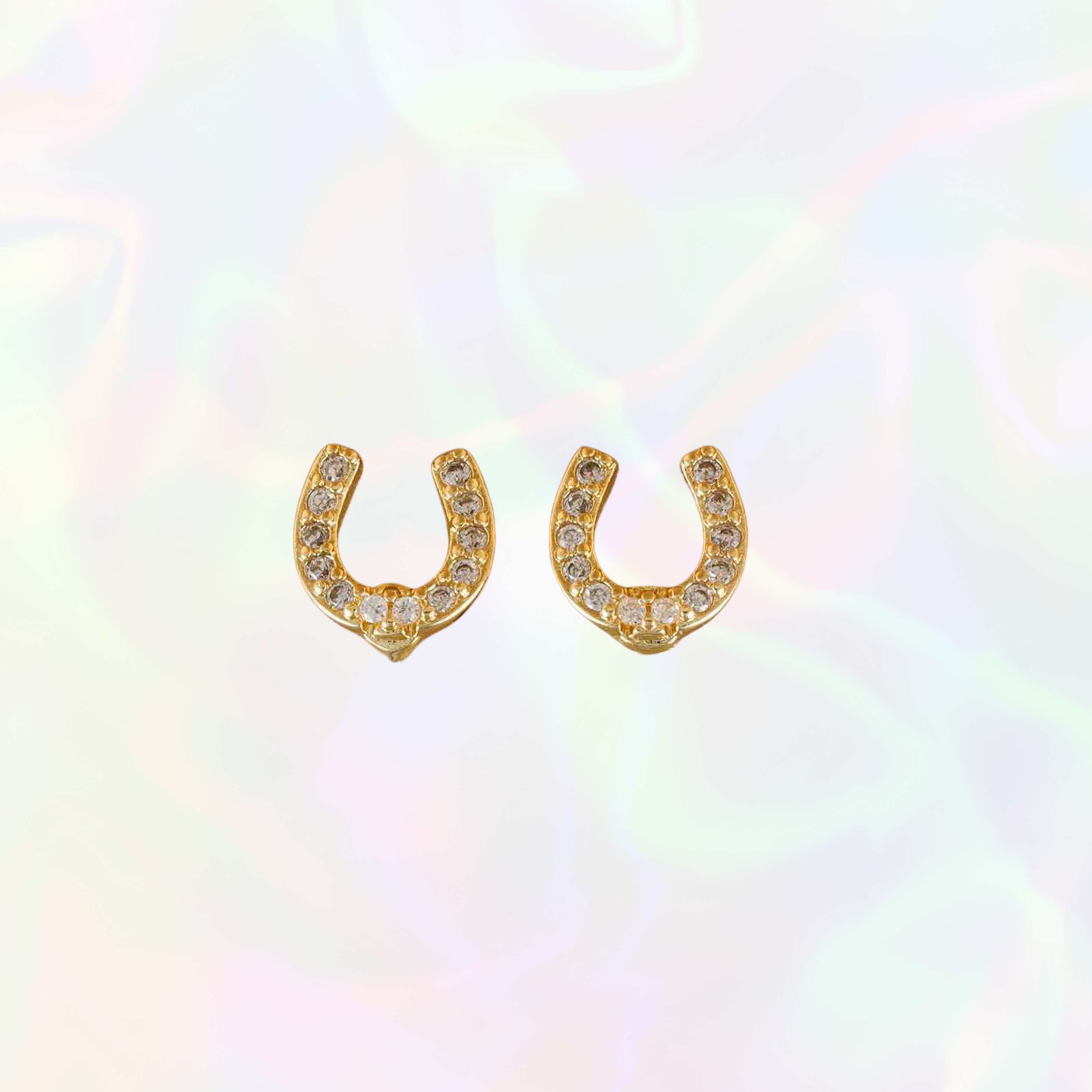 Gold horse shoe shaped stud earrings