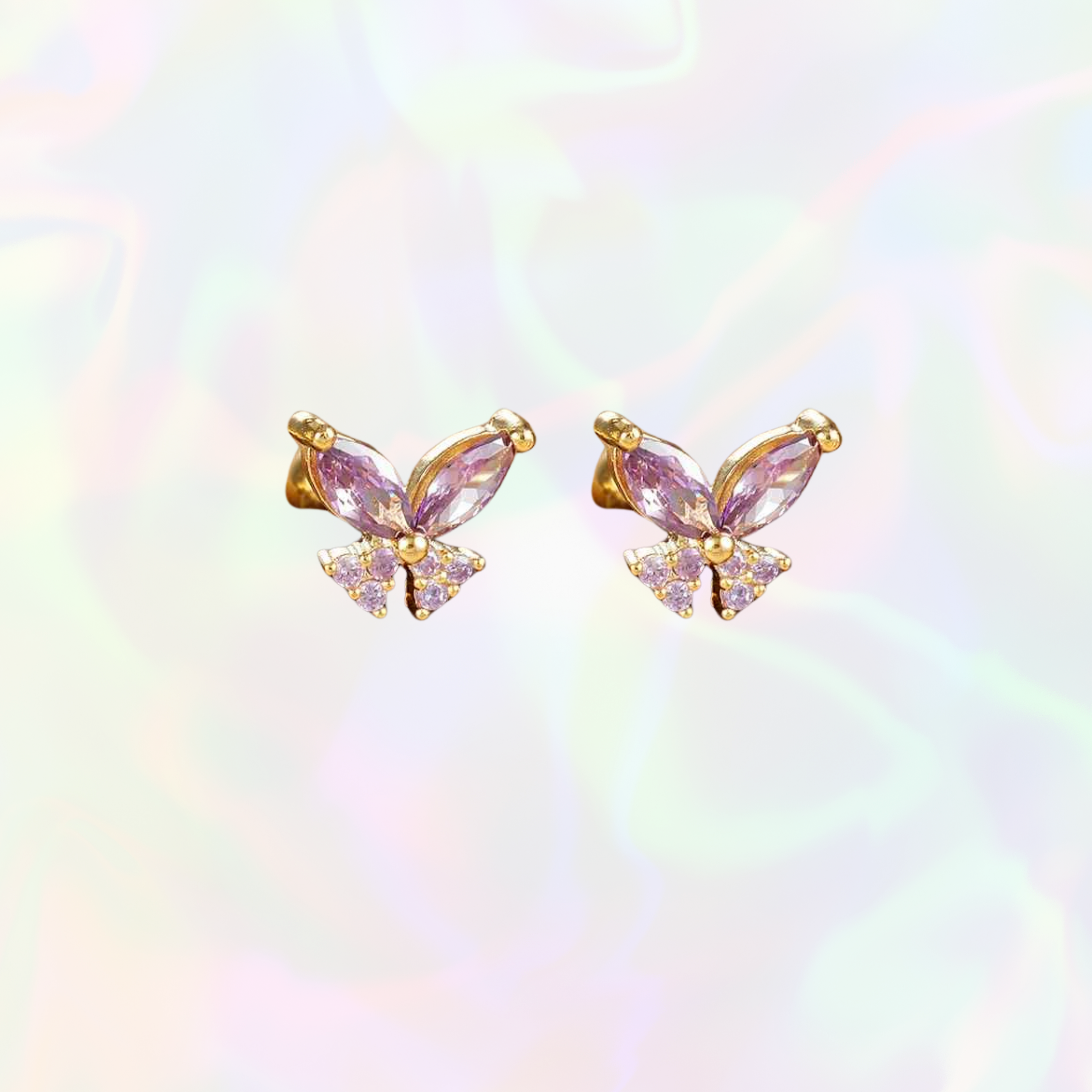 Dainty waterproof butterfly-shaped stud earrings with pink gemstones on a rainbow gradient background