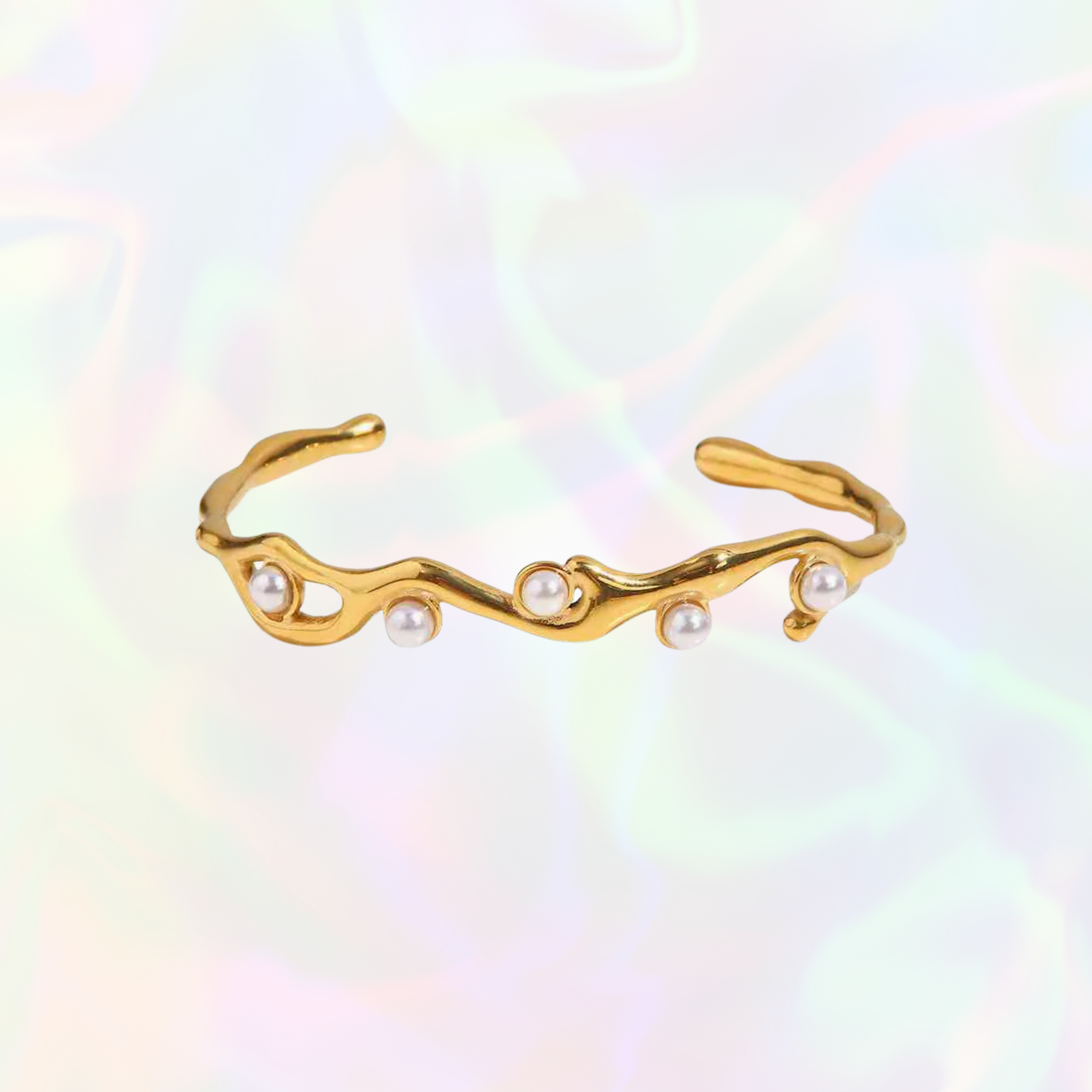Gold bracelet with pearls on a colorful gradient background