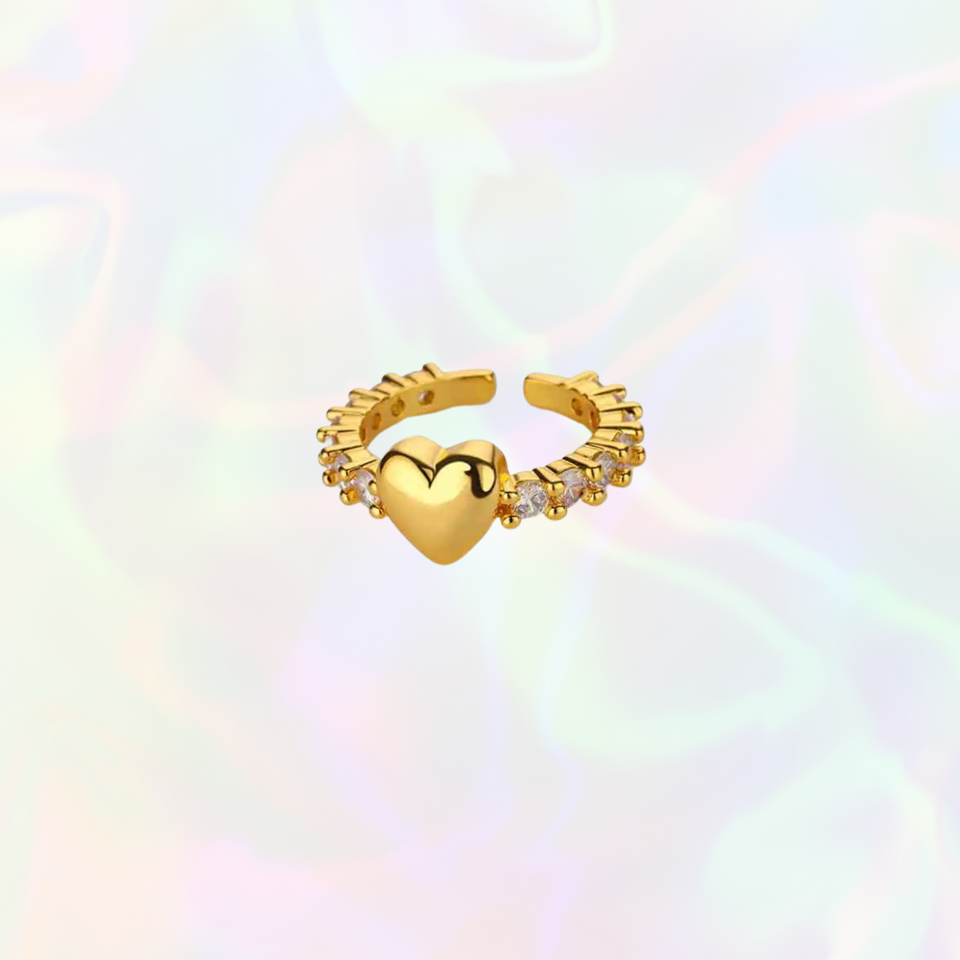 Gold heart-shaped earring with small diamonds on a rainbow gradient background