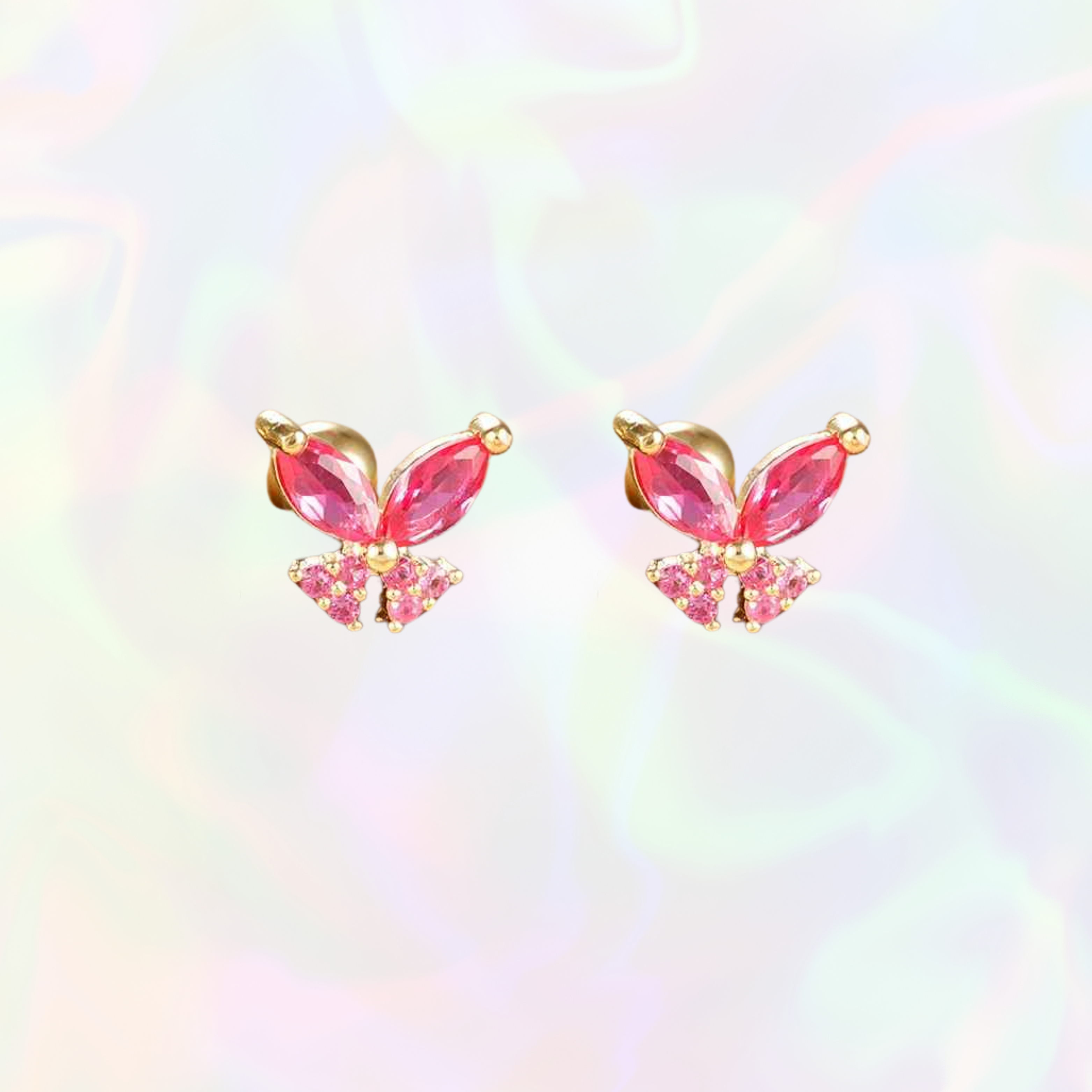 Pink butterfly-shaped stud earrings with gold accents on a colorful background
