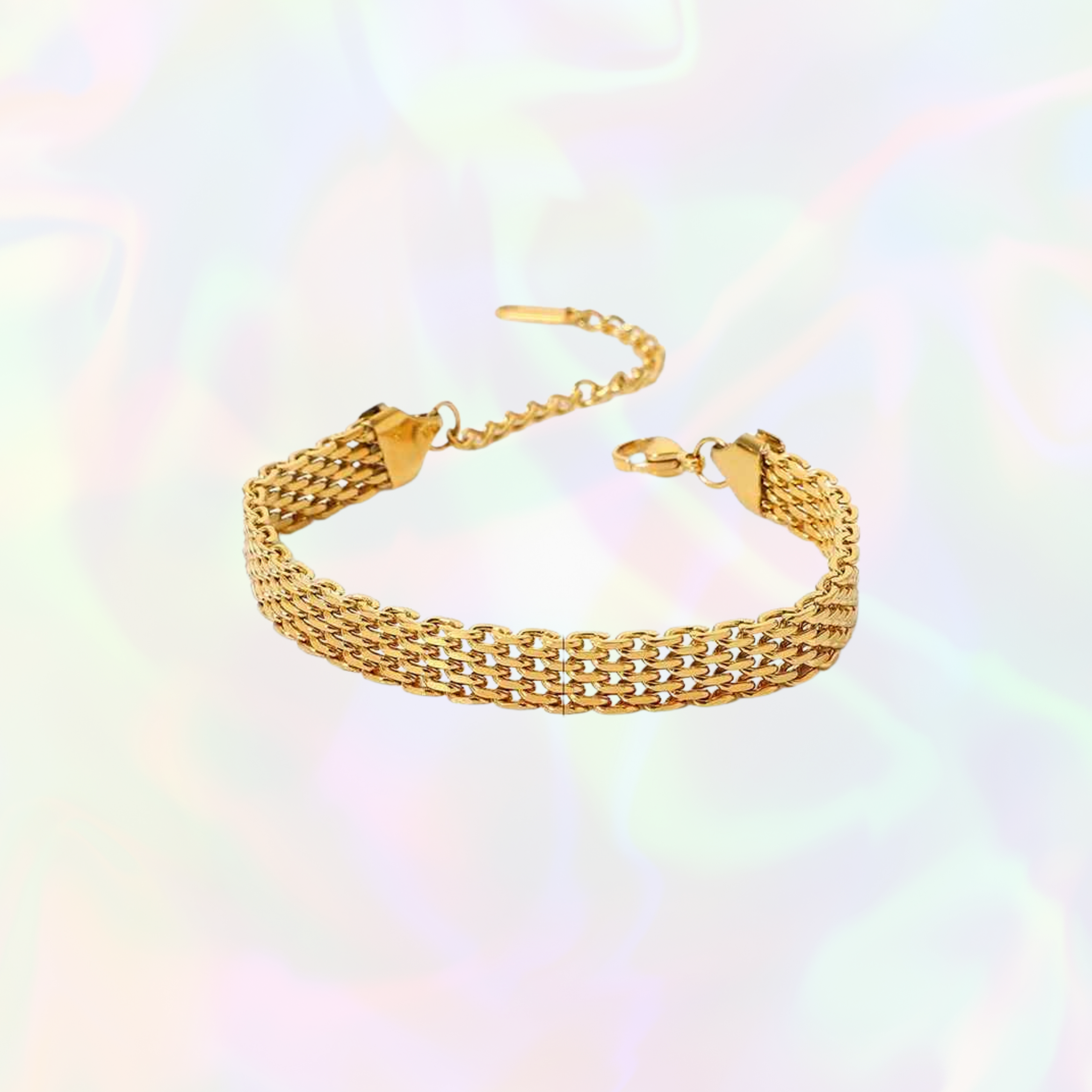 Gold chain bracelet on a multicolored background